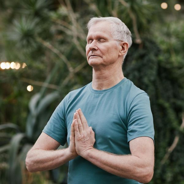 Man meditating after a workout, showing a sense of peace.